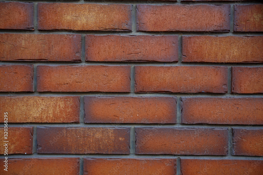 old textured red brick wall with cracks old textured red brick wall with cracks
