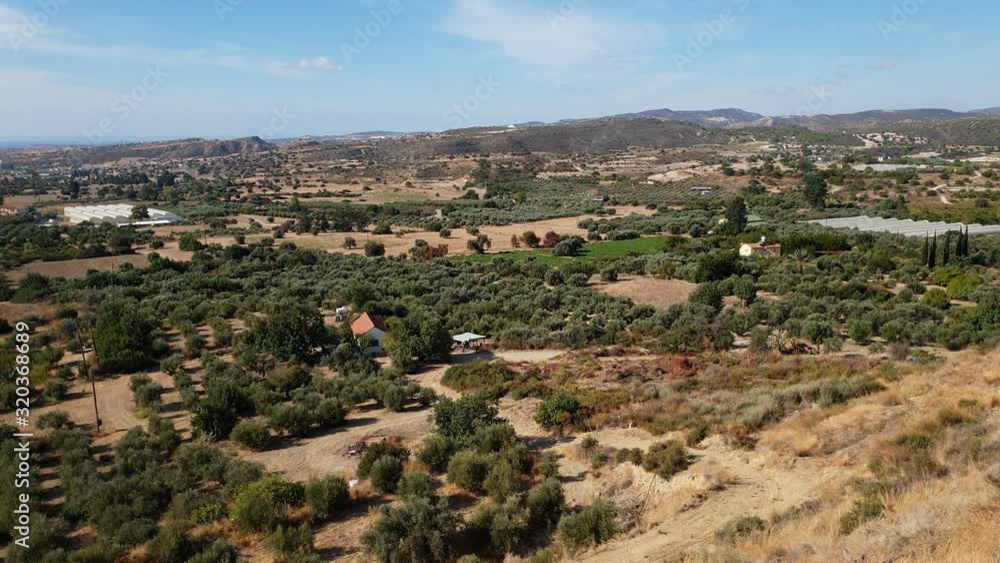 Valley with olive trees and rural houses. Cyprus Valley with olive trees and rural houses. Cyprus