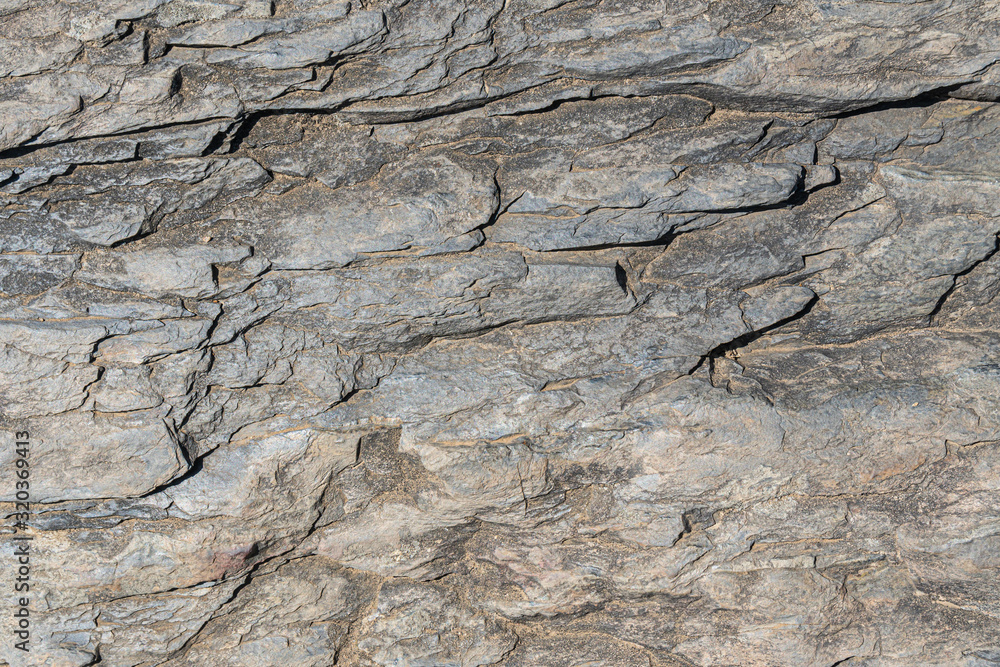 surface of the stone with grey, brown tint surface of the stone with grey, brown tint