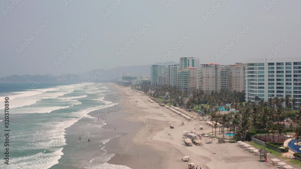 Famous Holiday Destination, Aerial View of Acapulco Beach, Mexico, Condomium and Apartment Buildings and Scenic Ocean Waves Famous Holiday Destination, Aerial View of Acapulco Beach, Mexico, Condomium and Apartment Buildings and Scenic Ocean Waves
