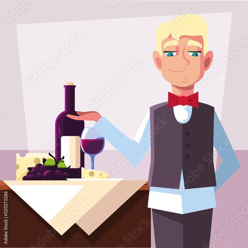 professional waiter holding bottle of wine © djvstock