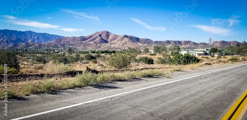 Desert mountains and Antelope Woods Road in Acton California. 