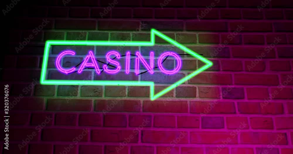Neon Casino sign with lighted text in Las Vegas or Nevada. Club den for entertainment or gambling Hall - 4k Neon Casino sign with lighted text in Las Vegas or Nevada. Club den for entertainment or gambling Hall - 4k
