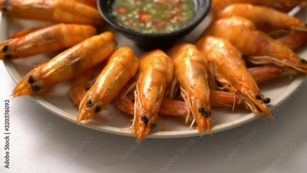 baked salted shrimps or prawns with seafood spicy sauce baked salted shrimps or prawns with seafood spicy sauce