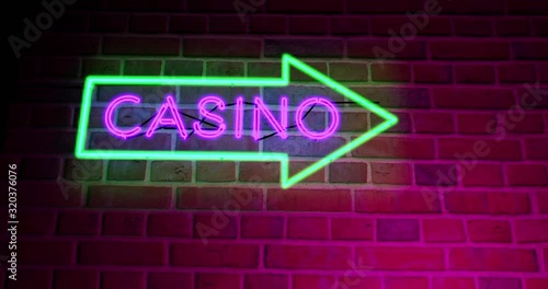 Neon Casino sign with lighted text in Las Vegas or Nevada. Club den for entertainment or gambling Hall - 4k