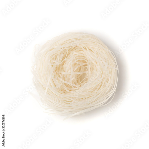 Raw dry rice noodles. Traditional asian rice vermicelli photo