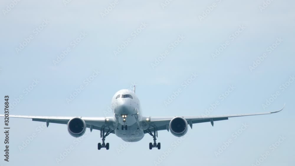Widebody aircraft approaching before landing Widebody aircraft approaching before landing