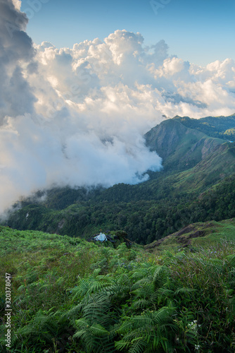 Clouds and mist floating in the mountain valley at sunset, Mulayit Taung, Moei Wadi, Myanmar