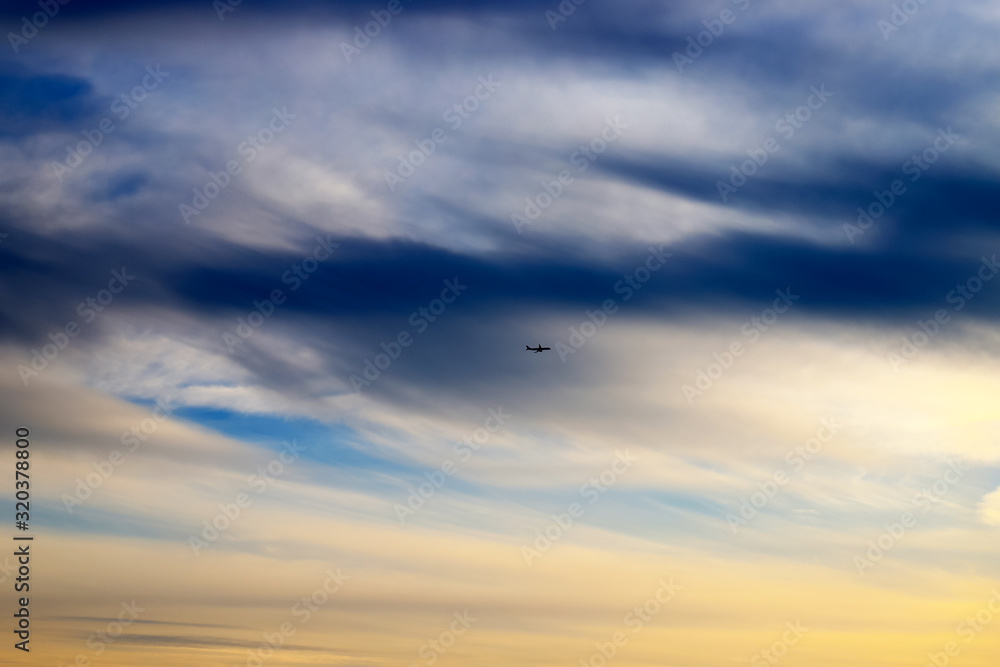 Beautiful picturesque white feather clouds in the blue sky, romantic background. А fantastic white clouds. Landscape background Beautiful picturesque white feather clouds in the blue sky, romantic background. А fantastic white clouds. Landscape background
