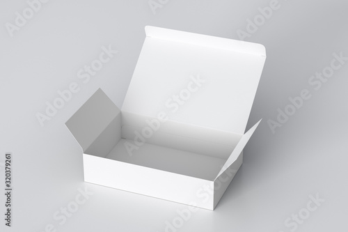 Blank white wide flat box with opened hinged flap lid on white background. Clipping path around box mock up. 3d illustration © dimamoroz