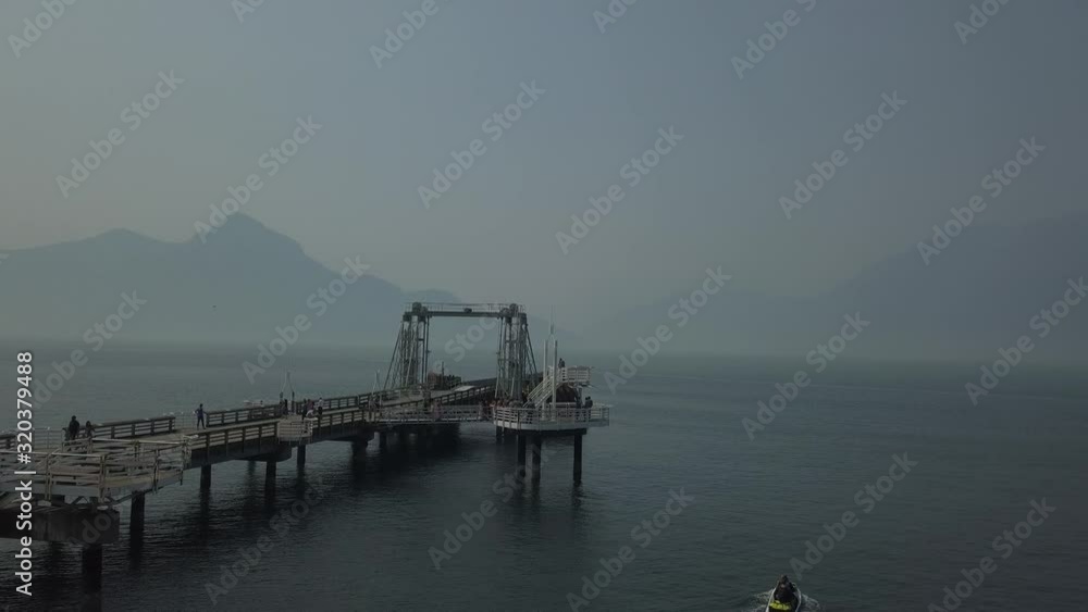 A drone shot flying over a dock A drone shot flying over a dock