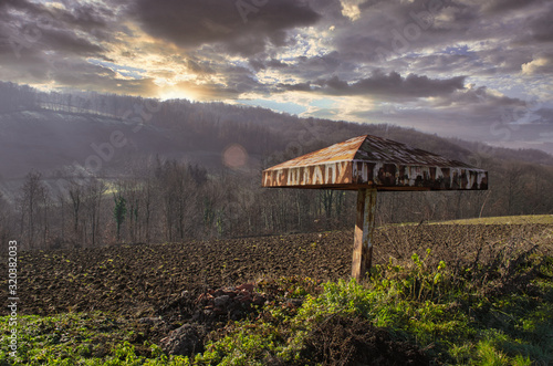 Abandoned Bus Stop In Mountains
