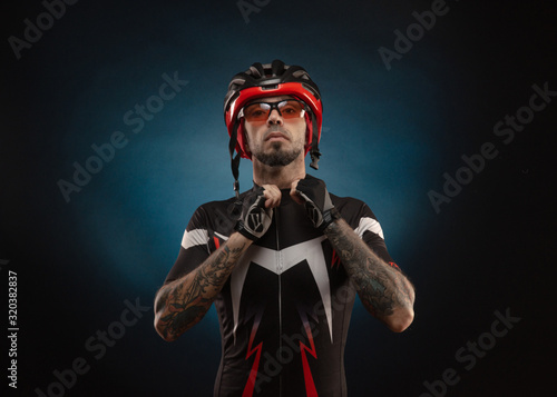 guy is a cyclist in a Bicycle helmet