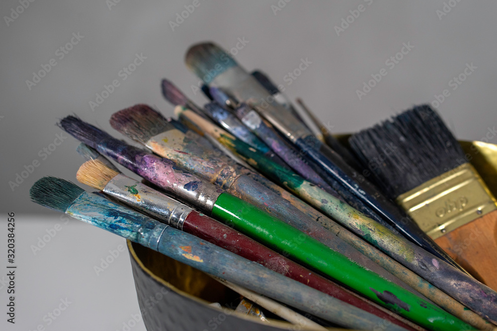 Fototapeta premium Colorful paint brushes Art concept. Painting process