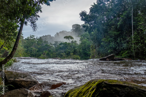 Rapids on Voltaire River, with morning mist, French Guiana