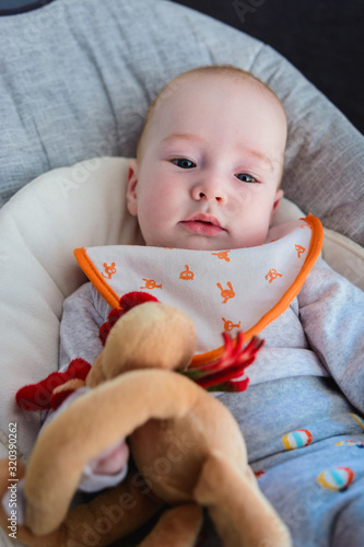 Young boy resting in the swing