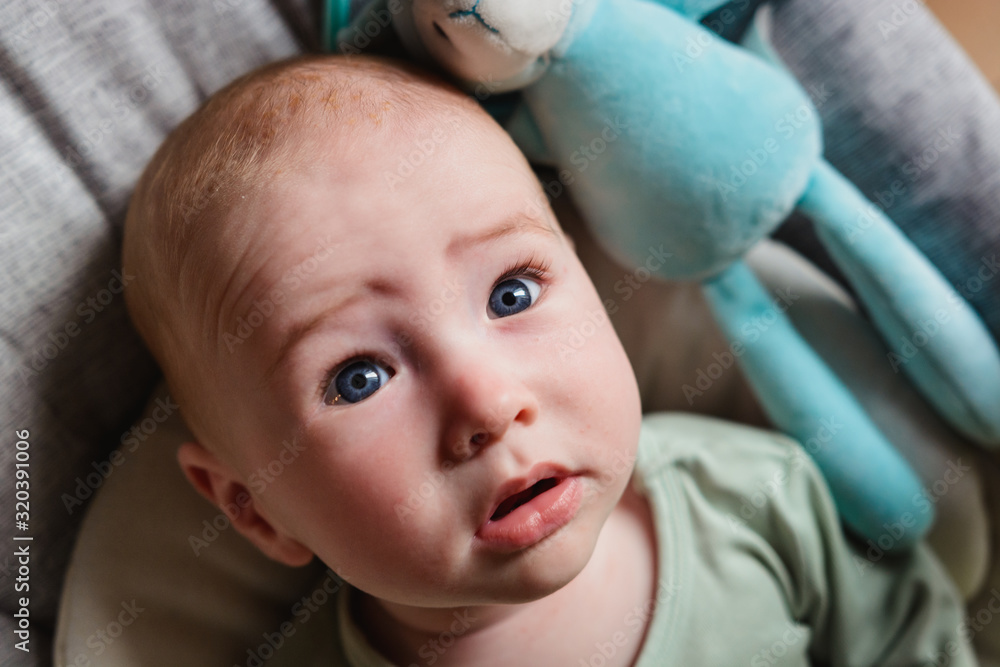 Young boy looking up