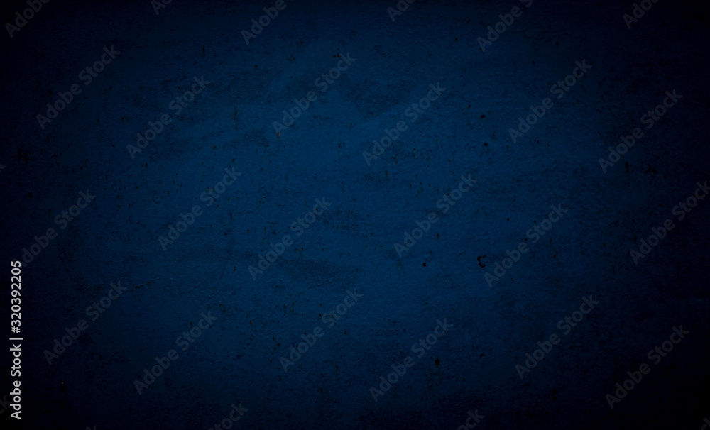 Blue background. Cement floor in a dark room with a spotlight. For installation. Blue background. Cement floor in a dark room with a spotlight. For installation.