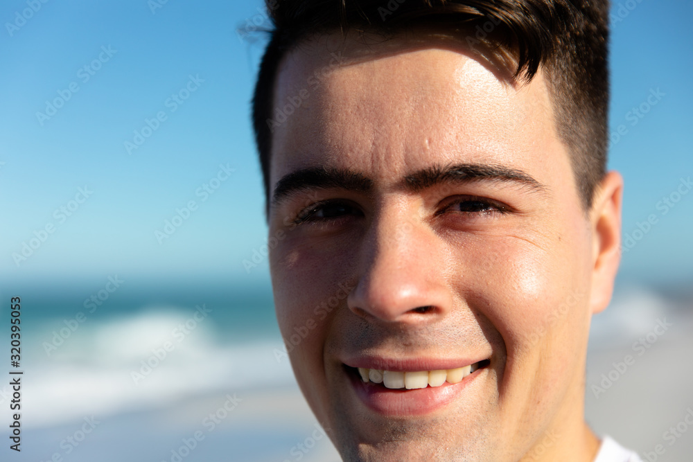 Portrait of young man smiling