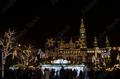 Viena, Austria, December 13th,2018: Main entrance of the main Christmas market at Viena city hall. Wiener Rathaus. Merry Christmas lights at the entrance.