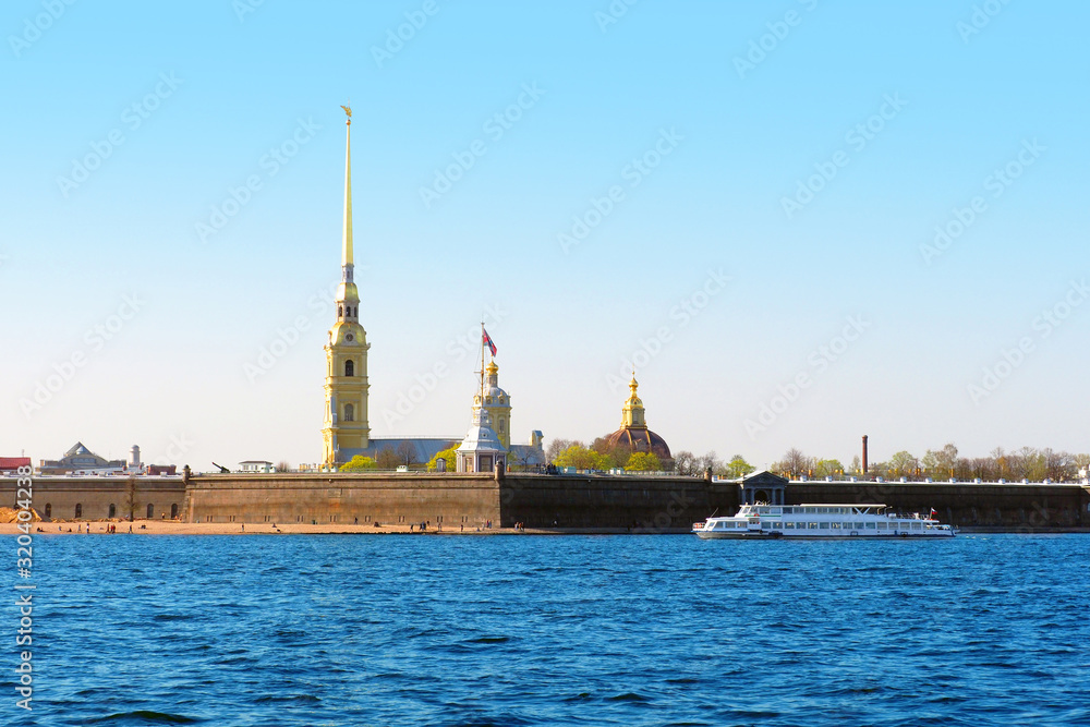 Neva river, Peter and Paul Cathedral in Saint Petersburg, Russia. Fortress, blue sky, spring