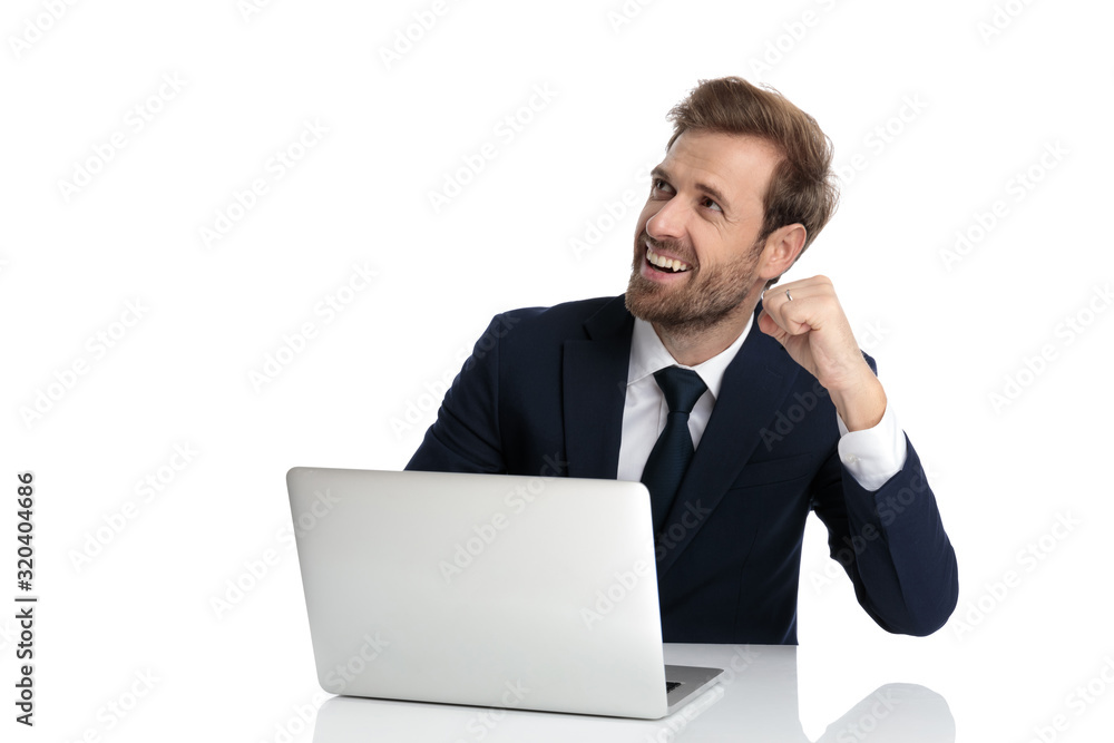 proud businessman laughing and celebrating victory proud businessman laughing and celebrating victory