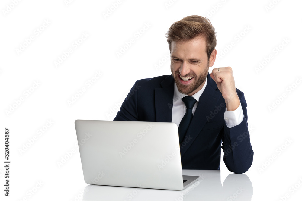 excited businessman reading emails and celebrating victory excited businessman reading emails and celebrating victory
