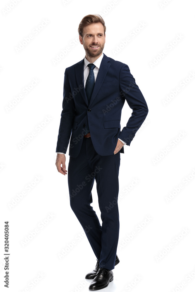 happy young businessman in navy blue suit smiling happy young businessman in navy blue suit smiling