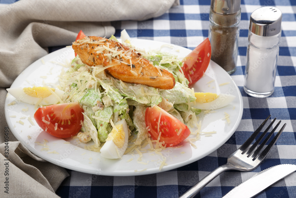 Caesar salad. Caesar salad with fresh lettuce, parmesan, fried croutons, chicken. Restaurant food, close up. Meat salad. Close up view. Caesar salad. Caesar salad with fresh lettuce, parmesan, fried croutons, chicken. Restaurant food, close up. Meat salad. Close up view.