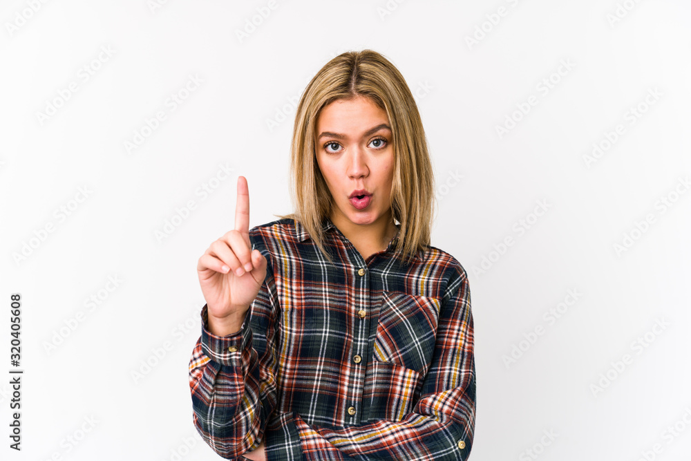 Young blonde caucasian woman isolated having some great idea, concept of creativity. Young blonde caucasian woman isolated having some great idea, concept of creativity.