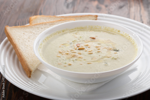 Delicious cream soup. Homemade creamy cheese soup. Potato and chicken cream soup.