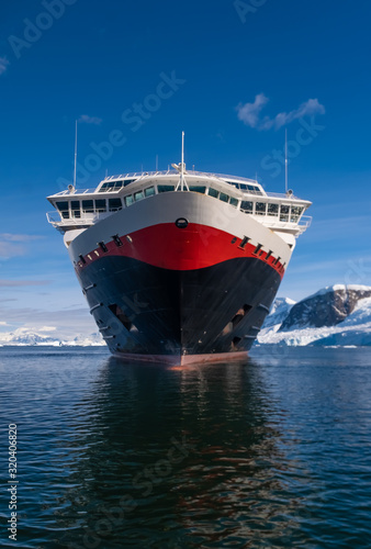 Cruising through the stunning icy landscapes of Antarctic peninsula © Luis