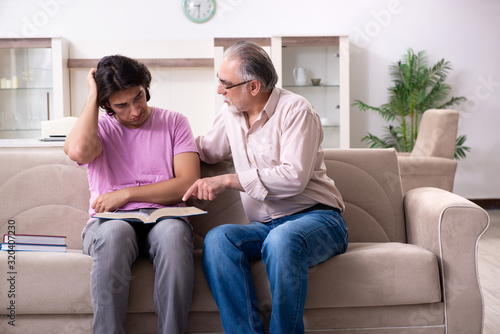 Young student and his father