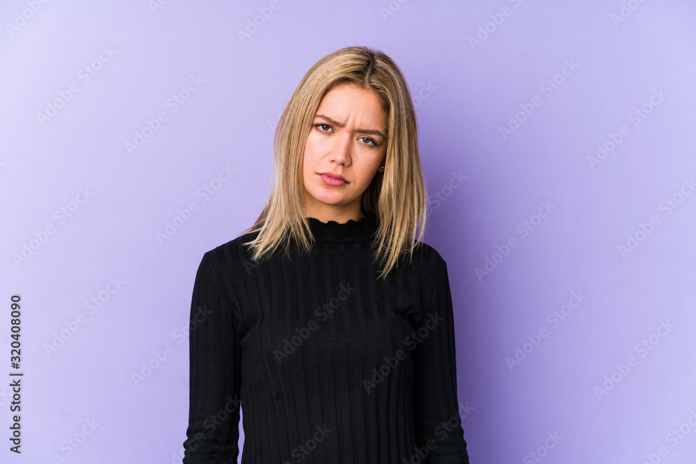 Young blonde caucasian woman isolated sad, serious face, feeling miserable and displeased. Young blonde caucasian woman isolated sad, serious face, feeling miserable and displeased.