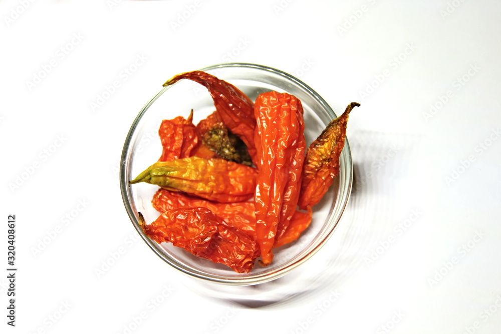 Dried orange chillies in a bowl