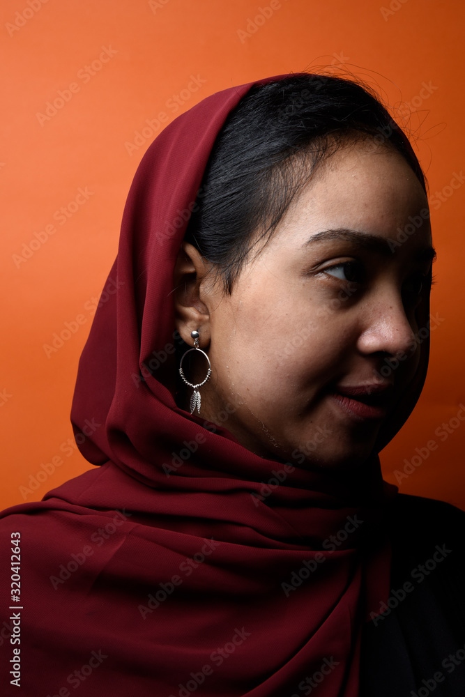 Muslim girl wearing Hijab with beautiful luxury earring Muslim girl wearing Hijab with beautiful luxury earring