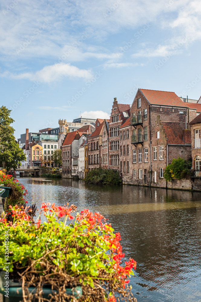 Vibrant street view of downtown Ghent, capital city of east Flanders province, Belgium along Leie river