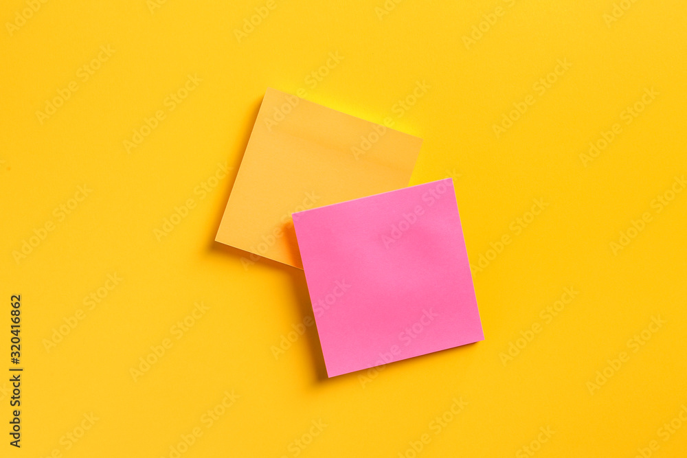 Sticky note papers on color background Sticky note papers on color background