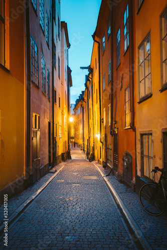 Photography Stockholm's Gamla Stan old town district at night, Sweden