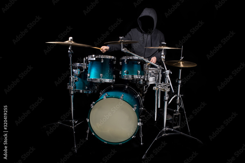 Fototapeta premium Close Up Of Drummer Playing Drum Kit In Studio