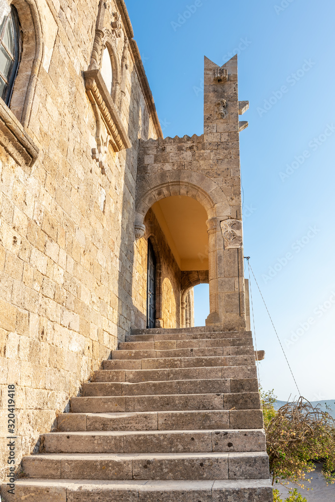 Side stairs to building of Monastery of Filerimos on Acropolis of Ialyssos (Rhodes, Greece)