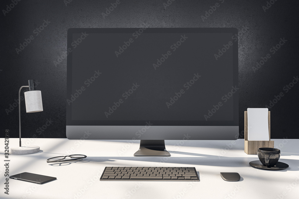 Fototapeta premium designer desktop with empty computer screen