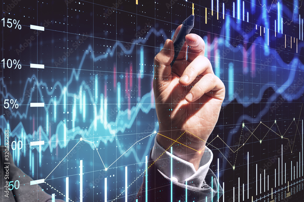 Businessman drawing creative stock chart Businessman drawing creative stock chart