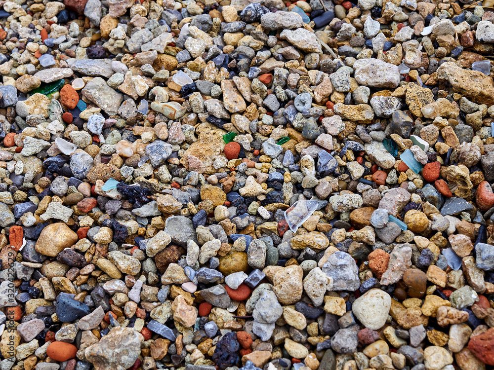 Beach of color rocks pebbles close up texture background Beach of color rocks pebbles close up texture background