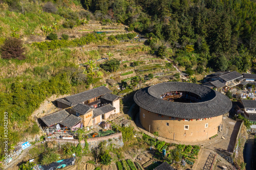 Aerial view of the traditional Chinese earth buildings of Hakka, The famous Nanjing Earth Building in Fujian Provence, China