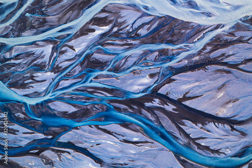 Aerial view of glacier river system in Iceland. Beautiful natural backdrop.