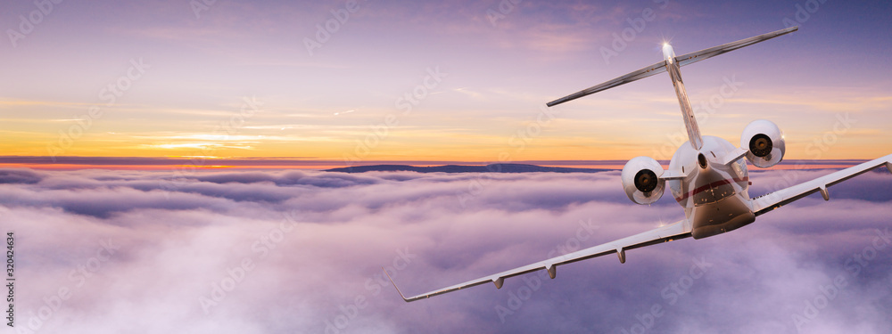 Fototapeta Mały prywatny odrzutowiec lecący nad pięknymi chmurami. Koncepcja podróży i transportu.