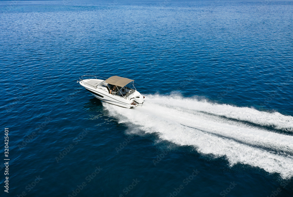 Fototapeta premium Speed boat in mediterranean sea, aerial view