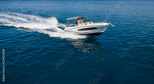 Speed boat in mediterranean sea, aerial view