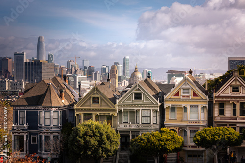 Painted Ladies houses and San Francisco's skyline at the back, California State, United States.